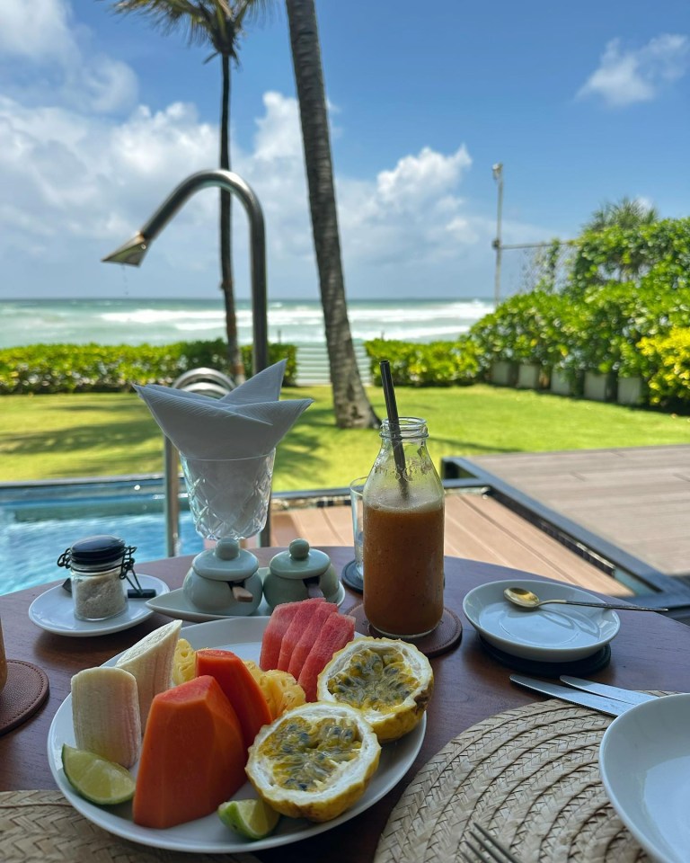 She showed off her fancy breakfast in her hotel with a stunning backdrop