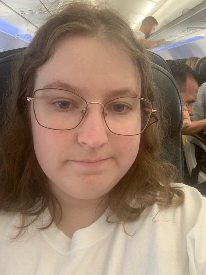 Morag was asking for 'good travel vibes' as she sat on a delayed flight