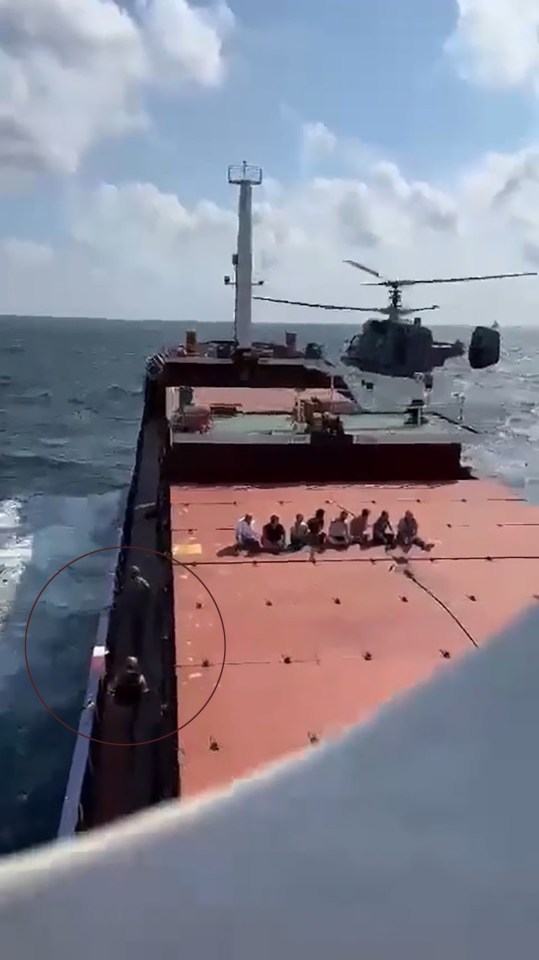 Crew members were lined up on deck as Russian forces inspected the ship