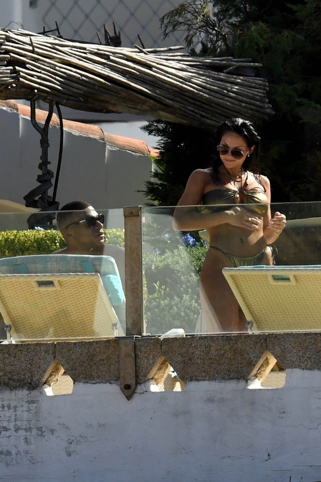 The forward was spotted alongside two bikini-clad friends