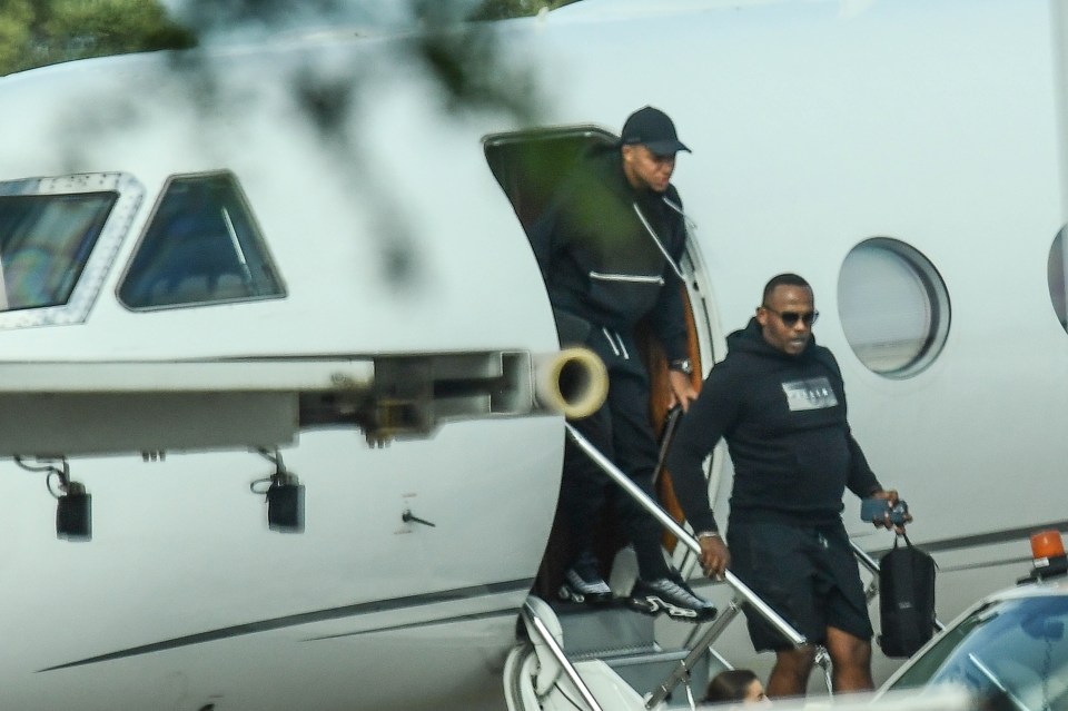 Mbappe jetted into Sardinia on what appeared to be a private jet alongside a friend