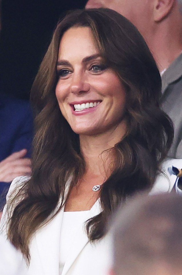 Kate Middleton looked tanned, glam and happy as she cheered on the England rugby team earlier this week