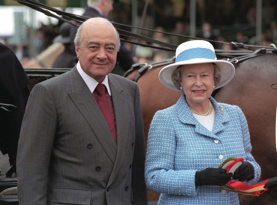 Mohamed pictured with the late Queen