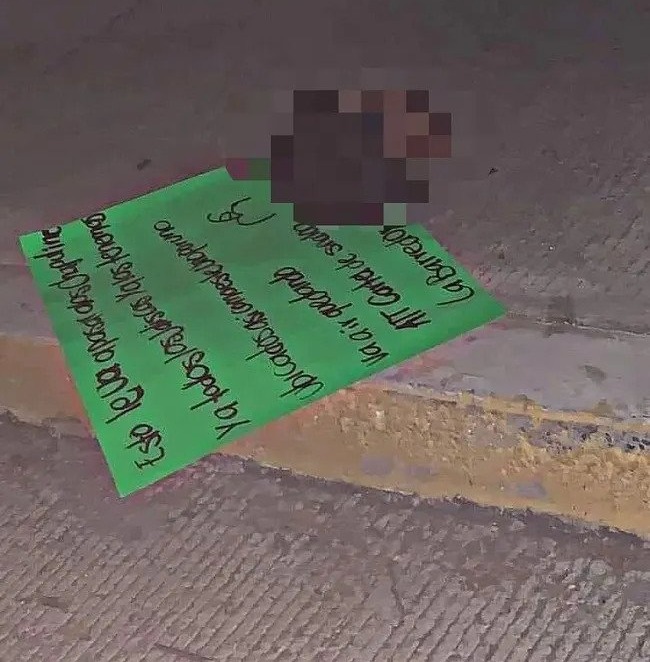 The Sinaloa Cartel left a severed head on the pavement as a warning to rivals