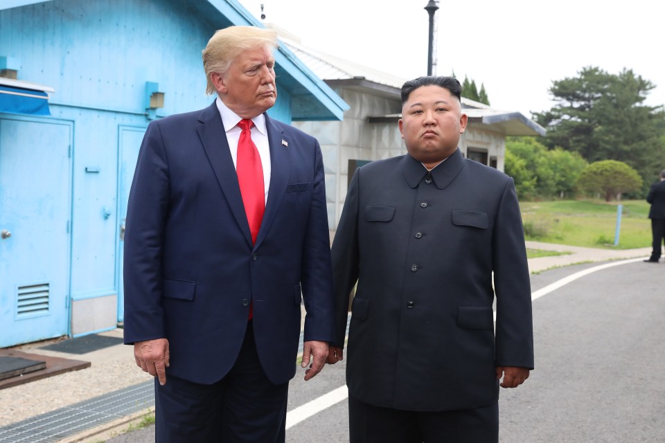 Former US president Donald Trump towers over Kim