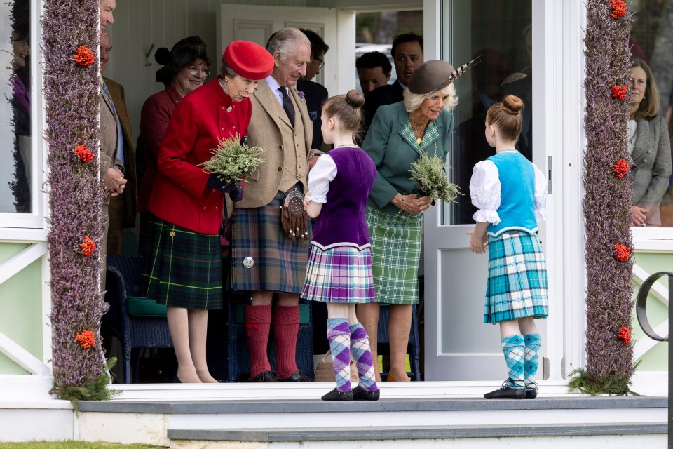 The royals greeting young guests at the event