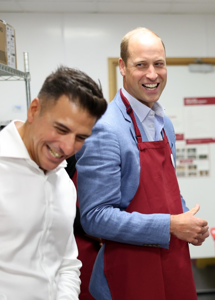 Prince William with Pret CEO Pano Christou during a visit to Pret A Manger in Bournemouth, England