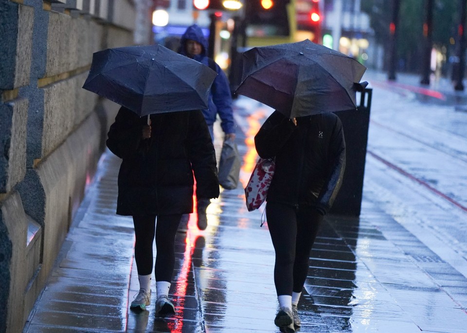 Manchester residents were battered by rain this morning