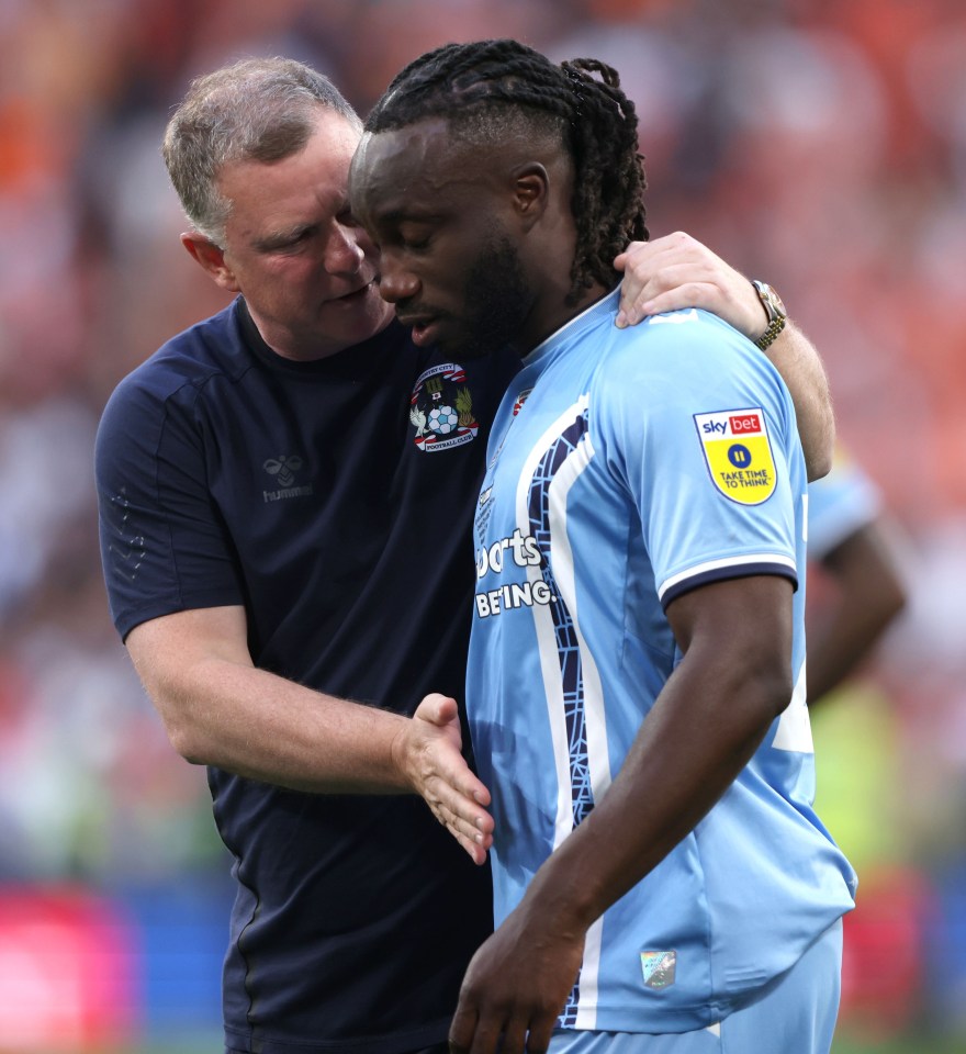 **Editorial use only, license required for commercial use. No use in betting, games or a single club/league/player publications** Mandatory Credit: Photo by Paul Marriott/Shutterstock (13936084co) Mark Robins (Coventry City manager) consoles Fankaty Dabo (CC) at the EFL Championship Play-Off Final Coventry City v Luton Town match at Wembley Stadium, London, UK on 26th May 2023. EFL Championship Play-Off Final Coventry City v Luton Town match at Wembley Stadium, London, UK on 26th May 2023., Wembley Stadium, London, London, UK - 27 May 2023