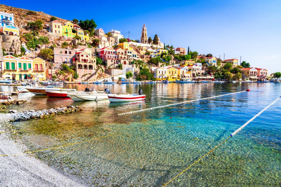 Symi (pictured) is home to colourful buildings