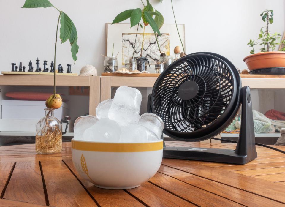 Placing ice, or a frozen water bottle, in front of your fan will make the air even colder - but don't leave a fan on overnight, and don't point it directly at your baby