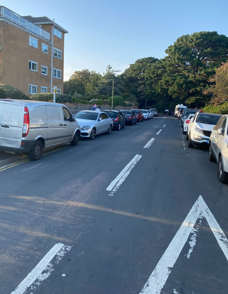 Double parking on a road near the beach