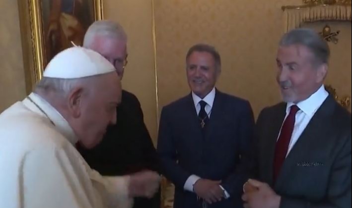 The Pope raised his fists in jest jokey response after Sly said 'we box'