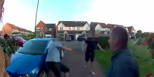 This is the moment a man headbutted his neighbour