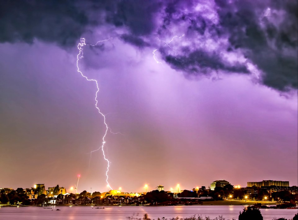 Lightning strikes were snapped over Poole in Dorset from the Isle of Wight last night