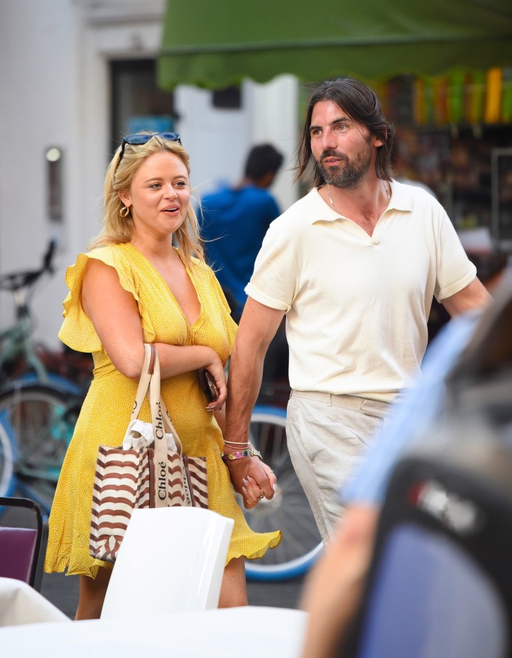 Emily Atack bags her own Oppenheimer as she walks hand in hand with NUCLEAR SCIENTIST Dr Alistair Garner in Chinatown after a cosy drinks date. The TV presenter was sat outside Cafe Boheme in Soho as she knocked back a cocktail while Alastair had a beer. ..Alistair describes himself on his Linkedin as a Materials scientist and electron microscopist specialising in nuclear and aerospace applications..*STRICTLY NO SUBSCRIPTIONS AND NO SOCIAL SOCIAL MEDIA USE*