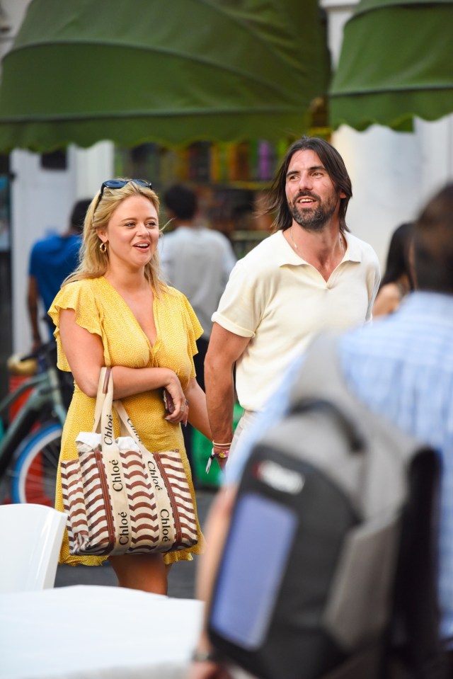 Emily Atack bags her own Oppenheimer as she walks hand in hand with NUCLEAR SCIENTIST Dr Alistair Garner in Chinatown after a cosy drinks date. The TV presenter was sat outside Cafe Boheme in Soho as she knocked back a cocktail while Alastair had a beer. ..Alistair describes himself on his Linkedin as a Materials scientist and electron microscopist specialising in nuclear and aerospace applications..*STRICTLY NO SUBSCRIPTIONS AND NO SOCIAL SOCIAL MEDIA USE*