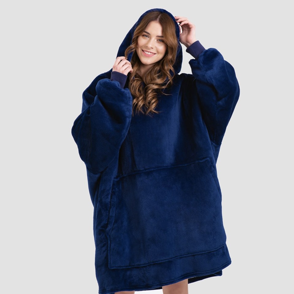 The Kuddly Hoodie Blanket features a sherpa fleece interior and is made entirely from ethical, vegan materials