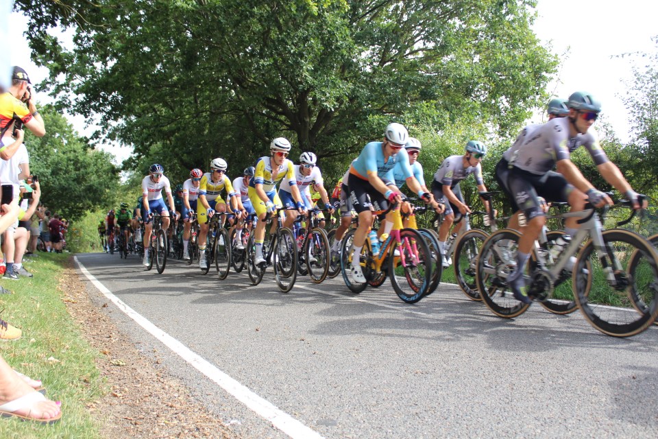 Locals watched the riders fly past their houses