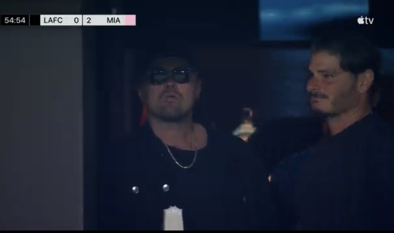 Leonardo DiCaprio enjoyed an ice lolly as he watched Messi in action