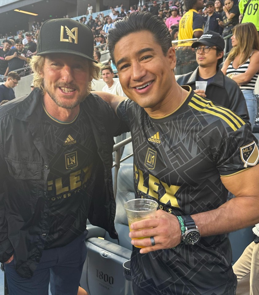 Actors Owen Wilson and Mario Lopez were snapped together in the crowd