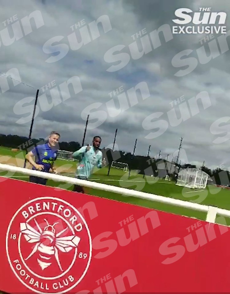 Ivan Toney can be seen jogging round a Brentford training pitch in August