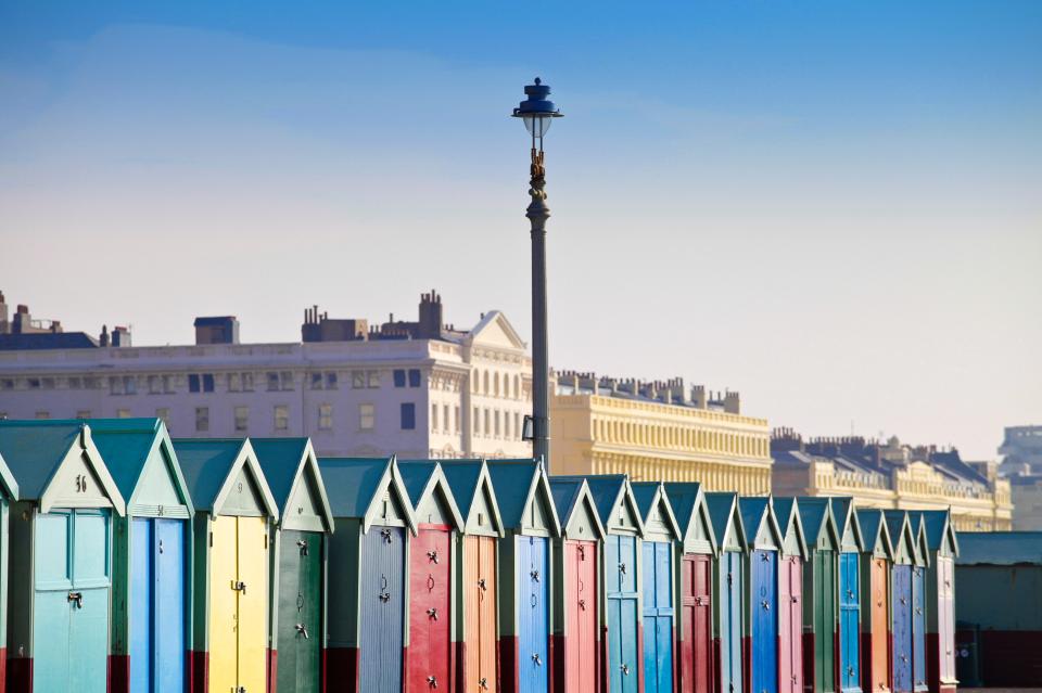 Beach huts on the seafront in Hove, Sussex