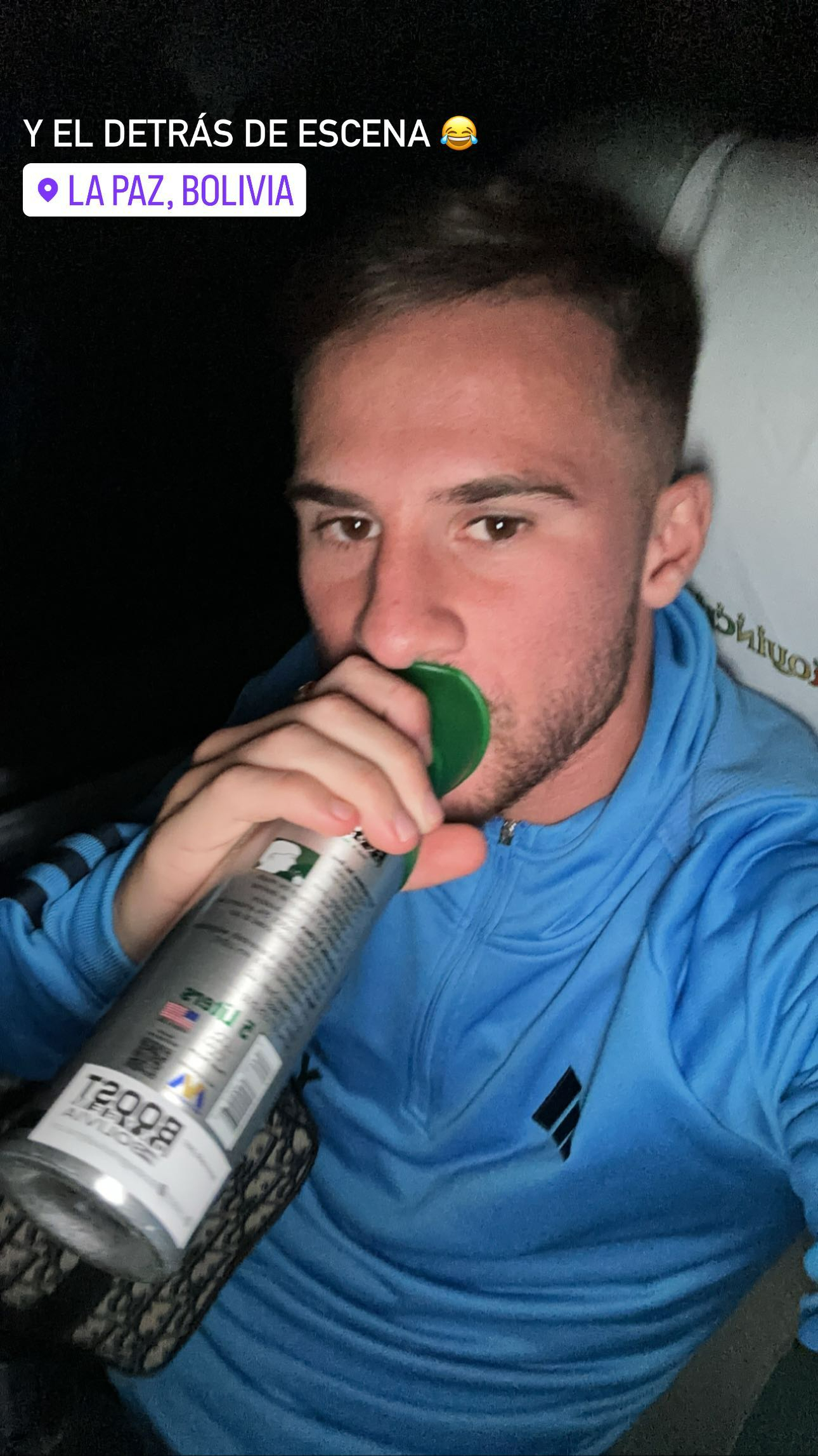 Argentina and Liverpool footballer Alexis Macallister using an oxygen tank before an away day to Bolivia's national stadium