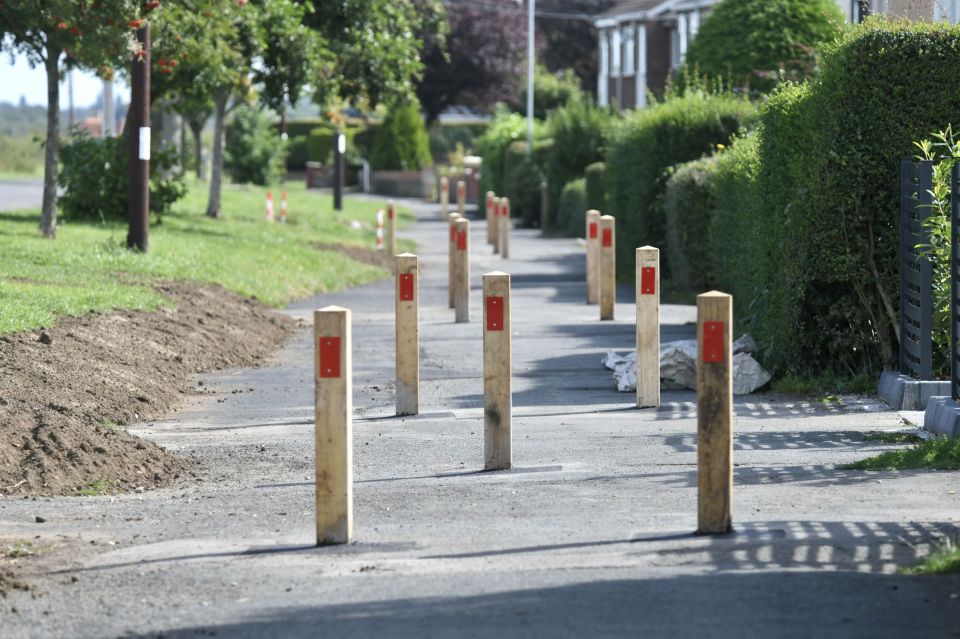 The council said they put the bollards up following complaints of vehicles being driven on the footpath