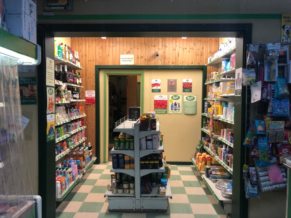 Another snap shows the famous Minute Mart newsagents lying idle with its striking green facade