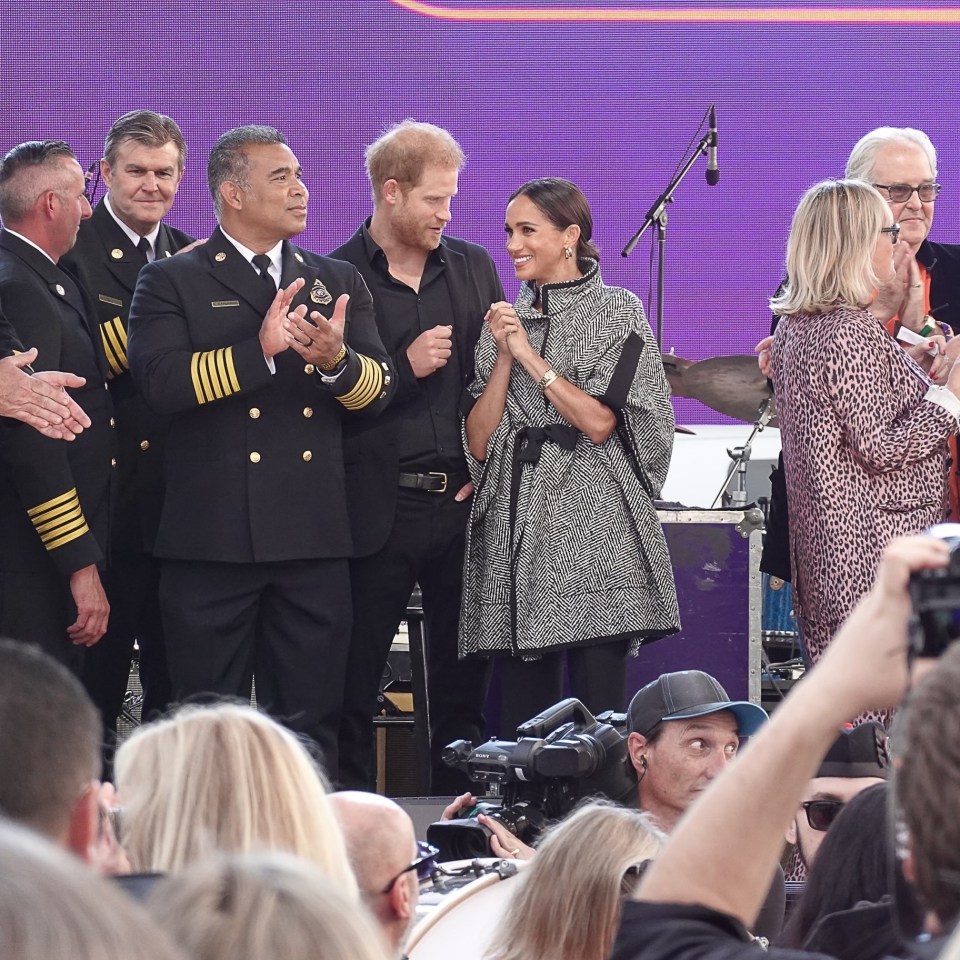 Meghan and Harry presented an award on stage at the event