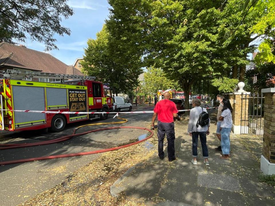 A huge blaze saw concerned residents standing outside