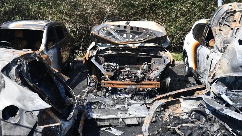 A devastating fire burned out five cars at Sydney Airport