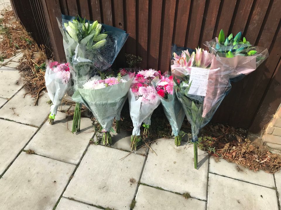 Floral tributes were placed at the scene in the hours after the horror unfolded