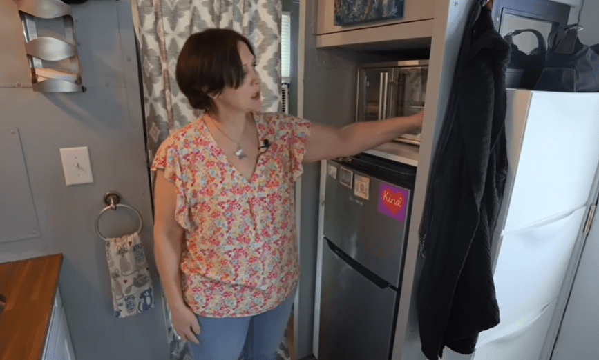 Karen has a small microwave oven in the kitchen