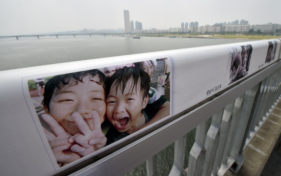 Photos of happy families and 'encouraging' slogans were deemed a failure