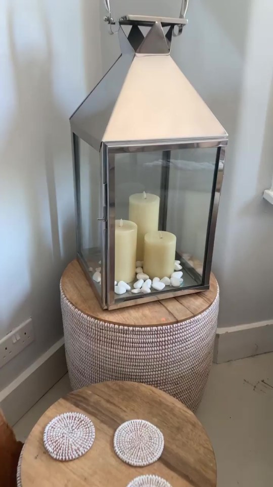 Hannah showed off some rustic side tables and a huge lantern