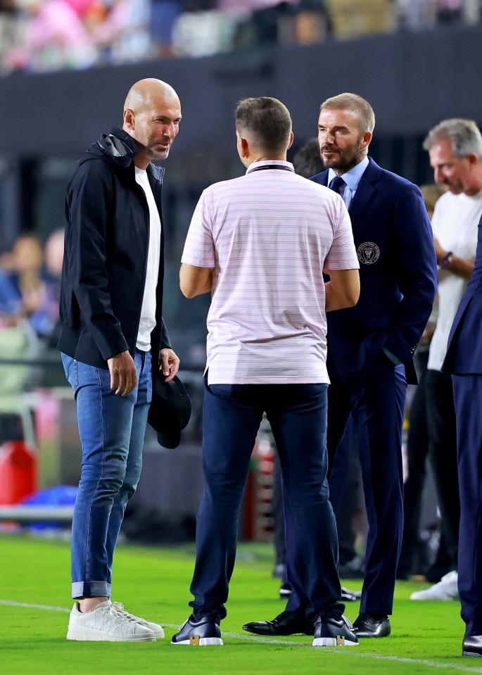 David Beckham speaks with Zinedine Zidane prior to kick off in Fort Lauderdale