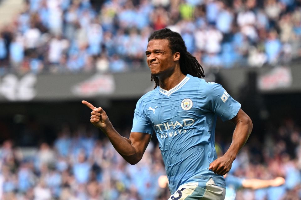 Ake wheeled away to celebrate at the Etihad