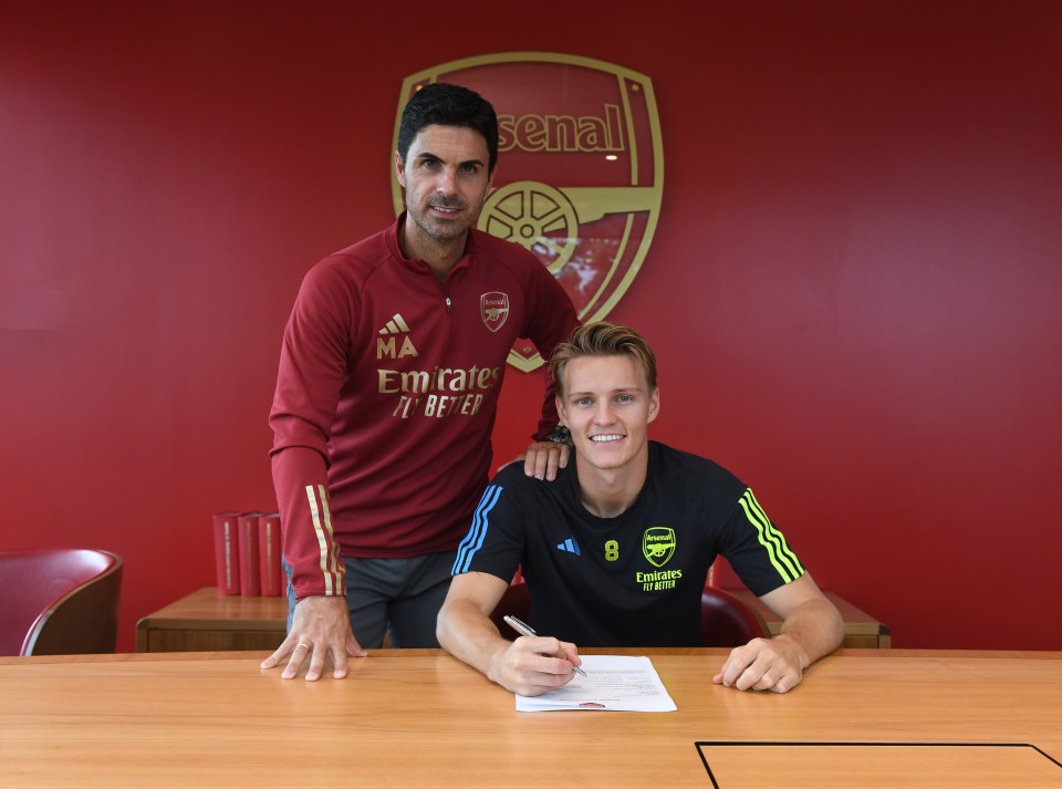 Mikel Arteta with his captain Martin Odegaard