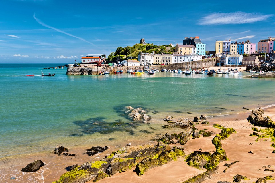 Just like Symi, Tenby (pictured) is home to stretches of golden sand