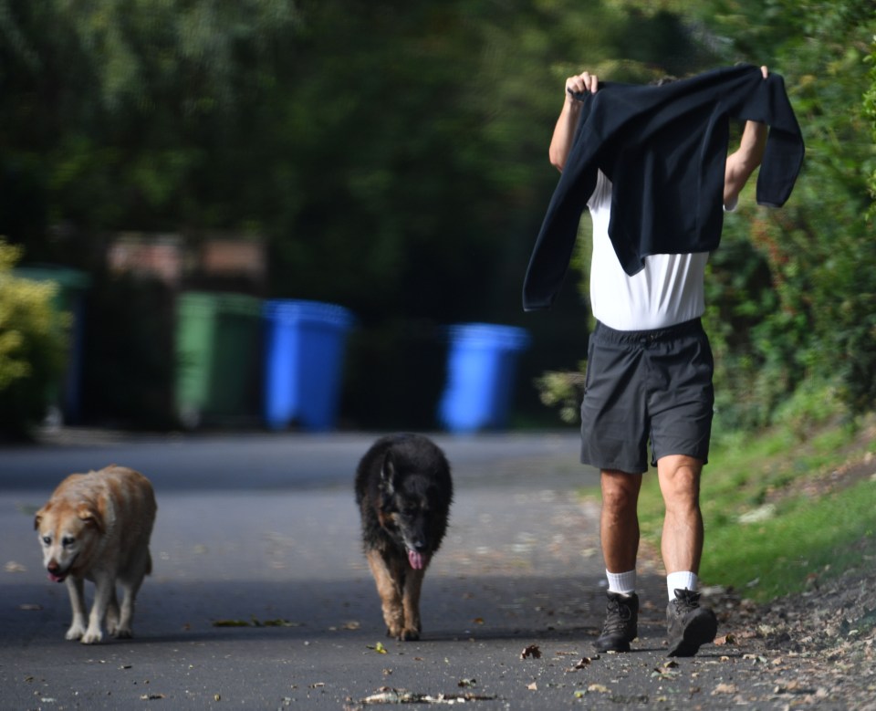 Roy Keane stepped out with his two dogs this morning