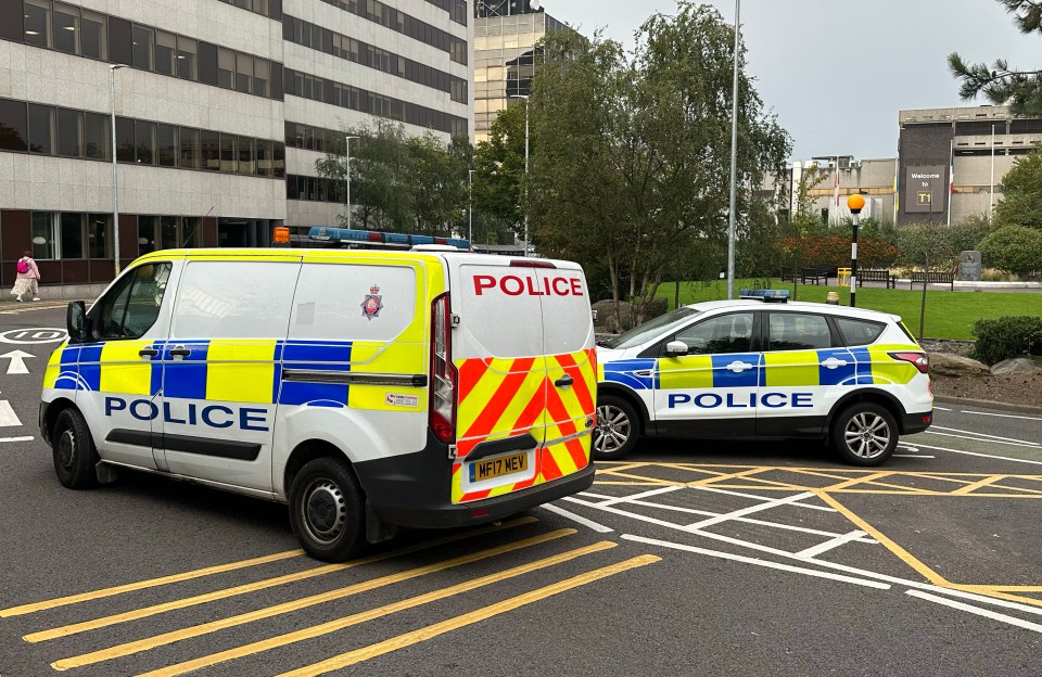 Police outside Manchester Airport this morning as the manhunt for Khalife enters its second day