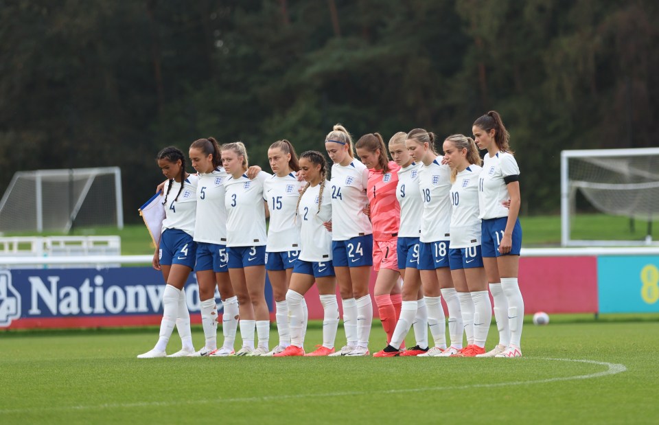 Players of England observe a minute of silence in tribute at the Women’s International match between England U19 v Germany U19 at St Georges Park on Tuesday