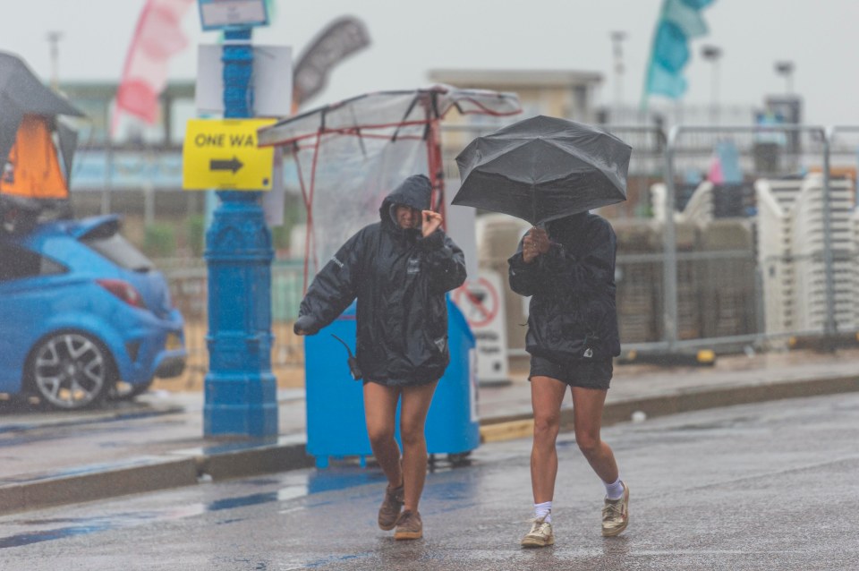 Brits were battered by wet weather in Bournemouth, Dorset, on Thursday