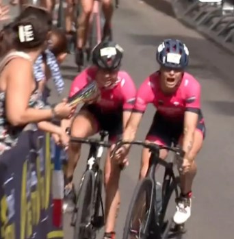 A triathlete was sent flying from her bike by her own teammate