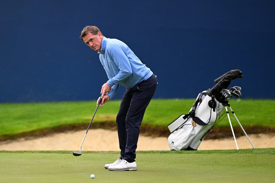 AP McCoy a picture of concentration as he takes a putt