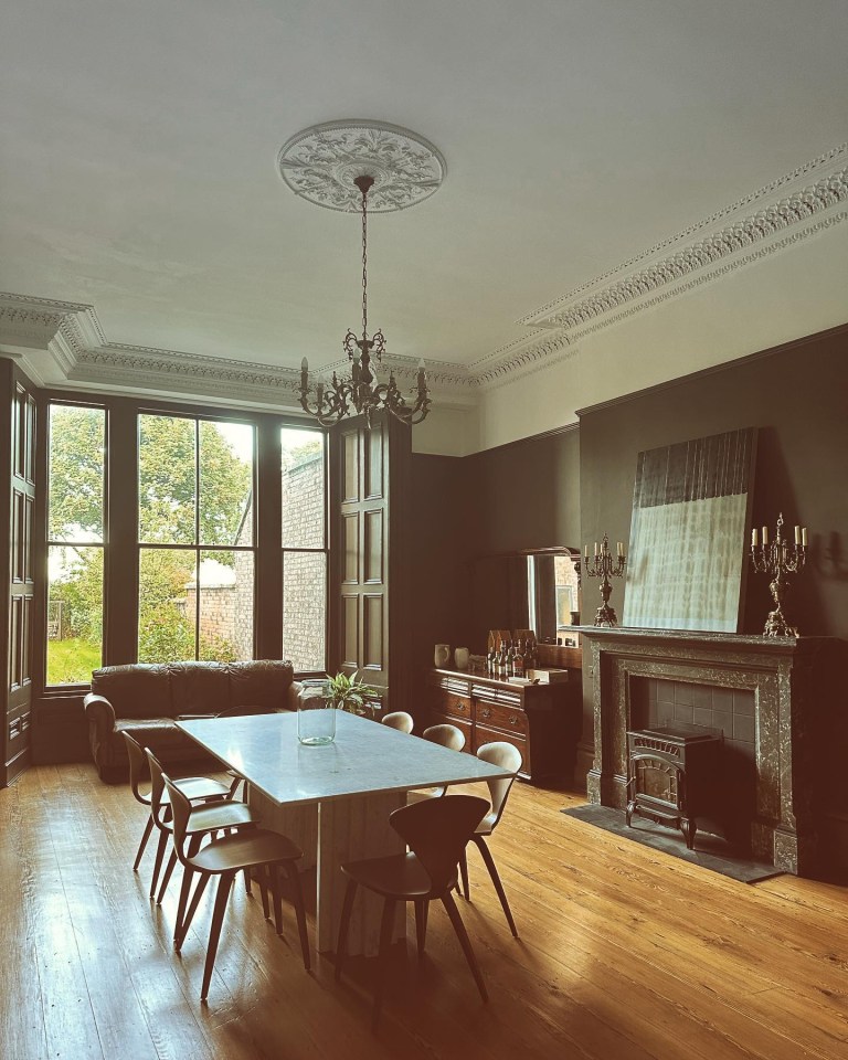 The dining room features a huge bay window