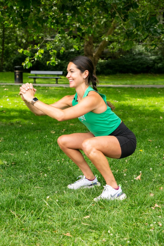 Lucy holding a squat