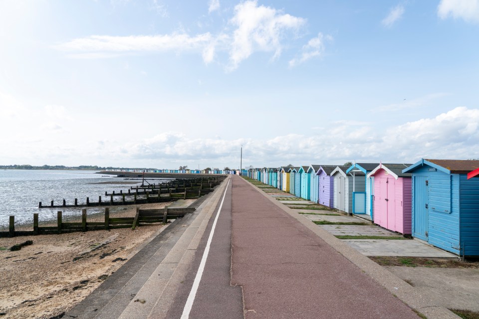 The stunning town is known for its small port and a row of colourful beach huts